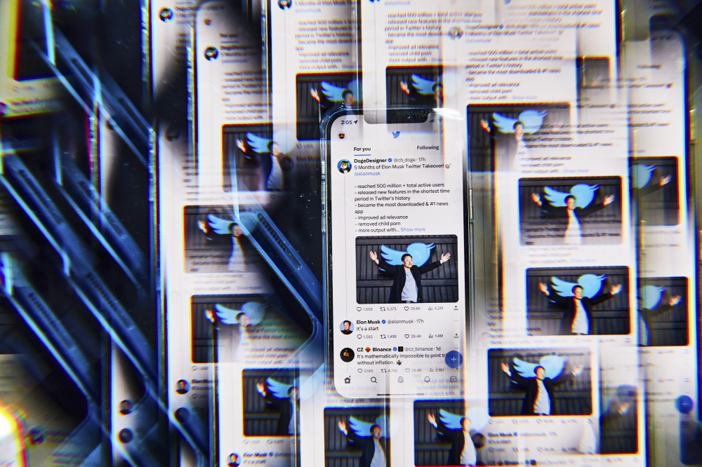 A photo illustration shows numerous mobile screens displaying a Twitter Feed. (Amy Lombard/The New York Times) 
