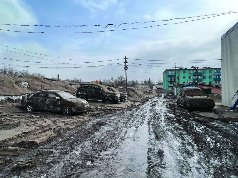 A view shows cars covered in volcanic dust following the eruption of Shiveluch volcano on Tuesday. — Reuters