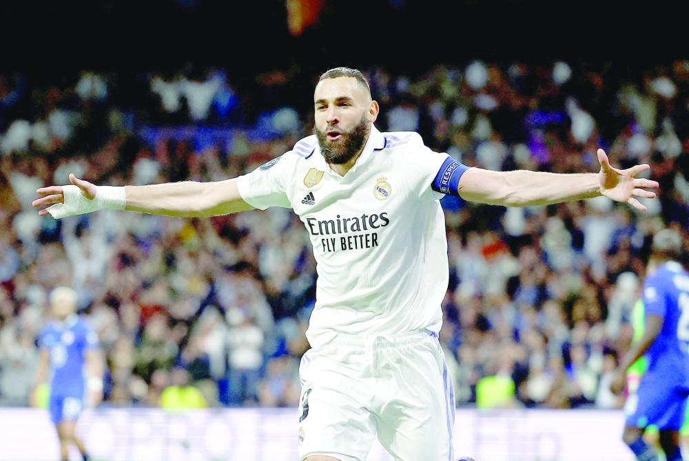 Soccer Football - Champions League - Quarter Finals - First Leg - Real Madrid v Chelsea - Santiago Bernabeu, Madrid, Spain - April 12, 2023 Real Madrid's Karim Benzema celebrates scoring their first goal REUTERS/Juan Medina     TPX IMAGES OF THE DAY
