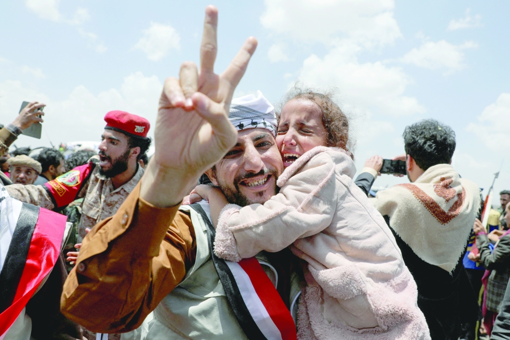 Freed prisoners at Sanaa Airport on Friday. — Reuters