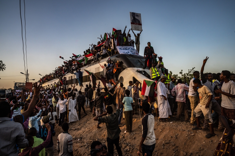 Protesters arrive in Sudans capital of Khartoum, April 23, 2019. (Bryan Denton/The New York Times)