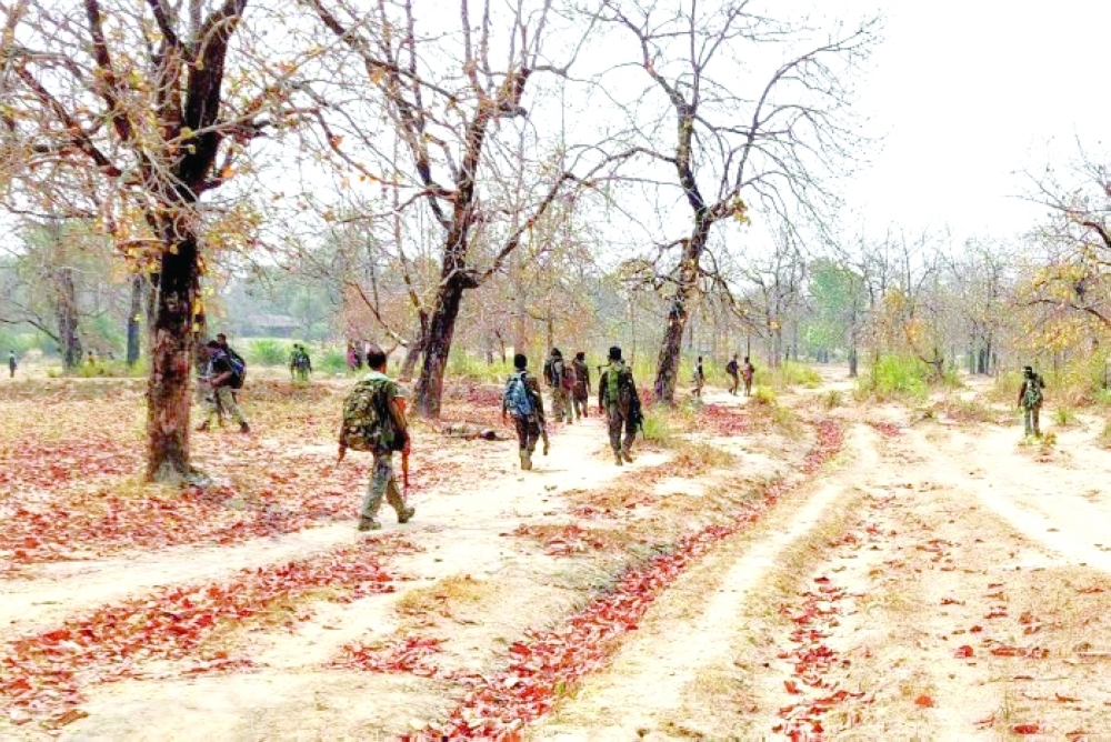 Security force personnel patrol after an attack by Maoist fighters in the central state of Chhattisgarh, India. Reuters file photo.