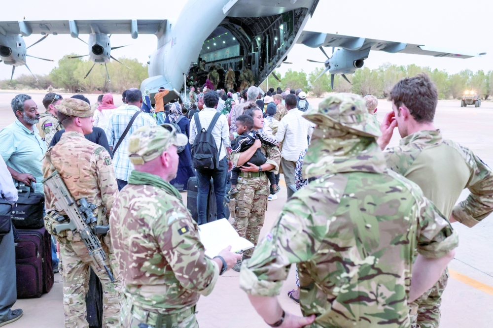 British nationals wait to board an RAF aircraft, during the evacuation to Cyprus, at Wadi Seidna Air Base in Sudan April 27, 2023. - REUTERS 