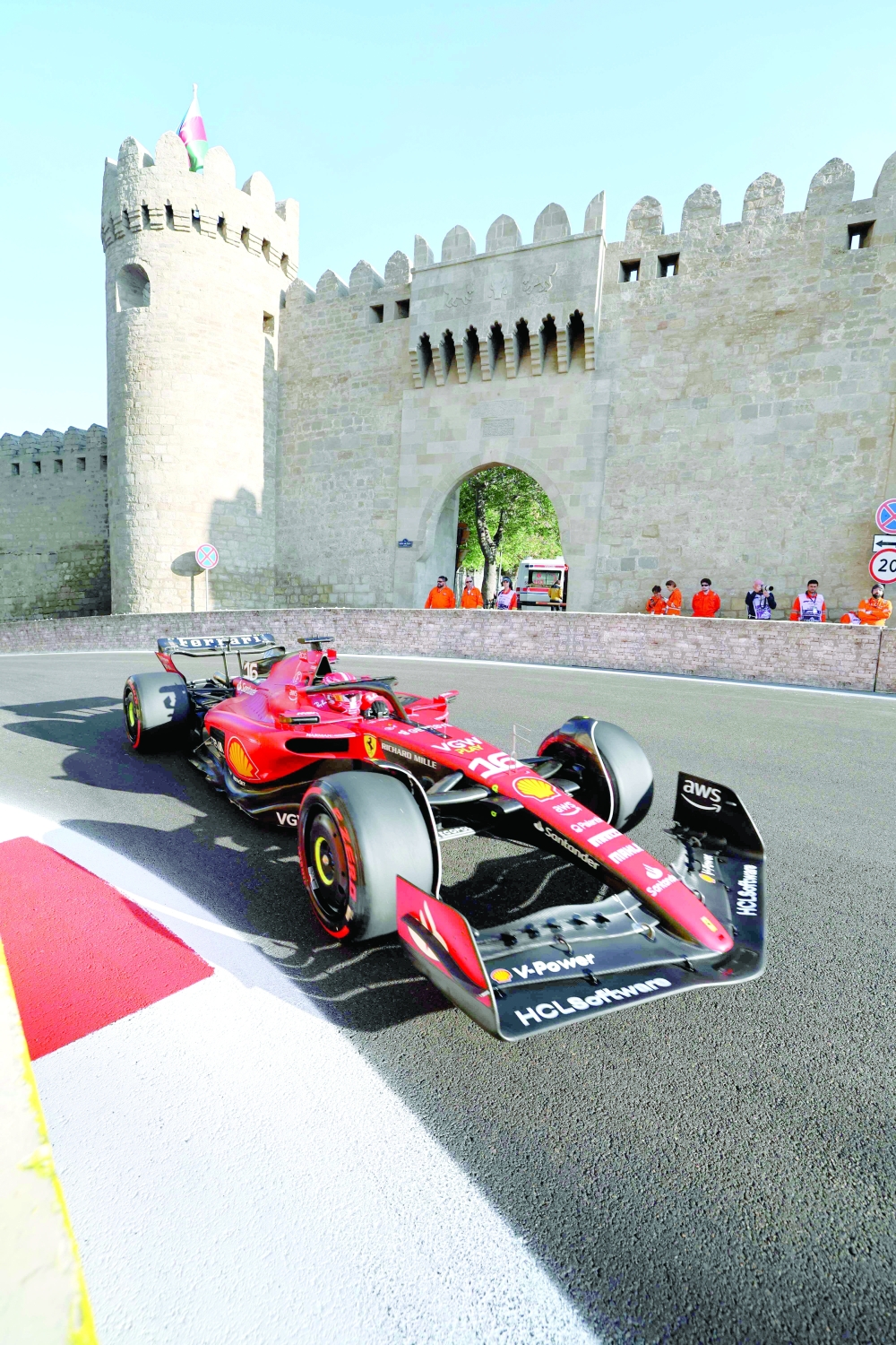 TOPSHOT - Ferrari's Monegasque driver Charles Leclerc steers his car during the qualifying session for the Formula One Azerbaijan Grand Prix at the Baku City Circuit in Baku on April 28, 2023. (Photo by Giuseppe CACACE  / AFP)


