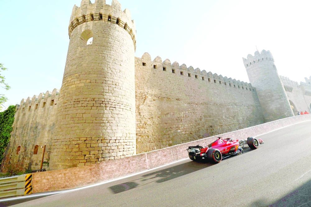 Ferrari's Monegasque driver Charles Leclerc steers his car during the qualifying session for the Formula One Azerbaijan Grand Prix at the Baku City Circuit in Baku on April 28, 2023. (Photo by Giuseppe CACACE  / AFP)

