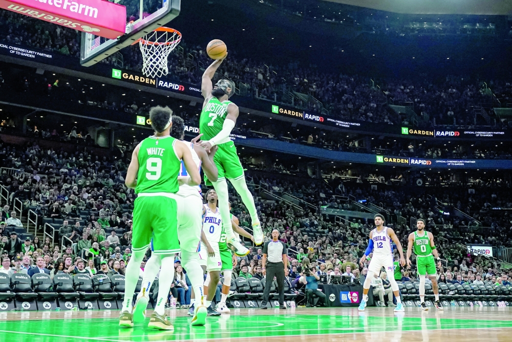 May 3, 2023; Boston, Massachusetts, USA; Boston Celtics guard Jaylen Brown (7) makes the basket against the Philadelphia 76ers in the third quarter during game two of the 2023 NBA playoffs at TD Garden. Mandatory Credit: David Butler II-USA TODAY Sports
