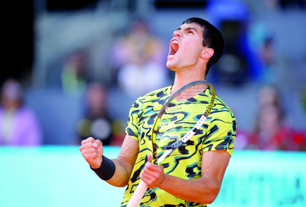 Tennis - Madrid Open - Park Manzanares, Madrid, Spain - May 3, 2023 Spain's Carlos Alcaraz reacts during his quarterfinal match against Russia's Karen Khachanov REUTERS/Juan Medina