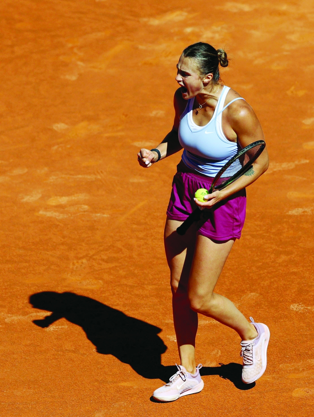 Belarus' Aryna Sabalenka reacts to winning a point against Greece's Maria Sakkari during their 2023 WTA Tour Madrid Open tennis tournament singles semi-final match at Caja Magica in Madrid on May 4, 2023. (Photo by PIERRE-PHILIPPE MARCOU / AFP)

