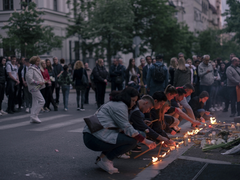 A vigil the day after eight students and a security guard were killed by an armed seventh grader at a school in Belgrade, Serbia, May 4, 2023. (Vladimir Zivojinovic/The New York Times)