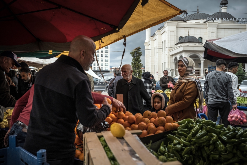 A produce market in Kayseri, Turkey, on April 20, 2023. Extremely high inflation, which surpassed 80 percent last year, has left many Turks feeling poorer.  (Sergey Ponomarev/The New York Times)