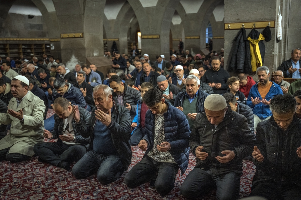 Muslims pray in a mosque at the end of the holy fasting month of Ramadan in Kayseri, Turkey, on April 21, 2023 last month. President Recep Tayyip Erdogan has expanded the place for religious people in Turkeys secular state.  (Sergey Ponomarev/The New York Times)