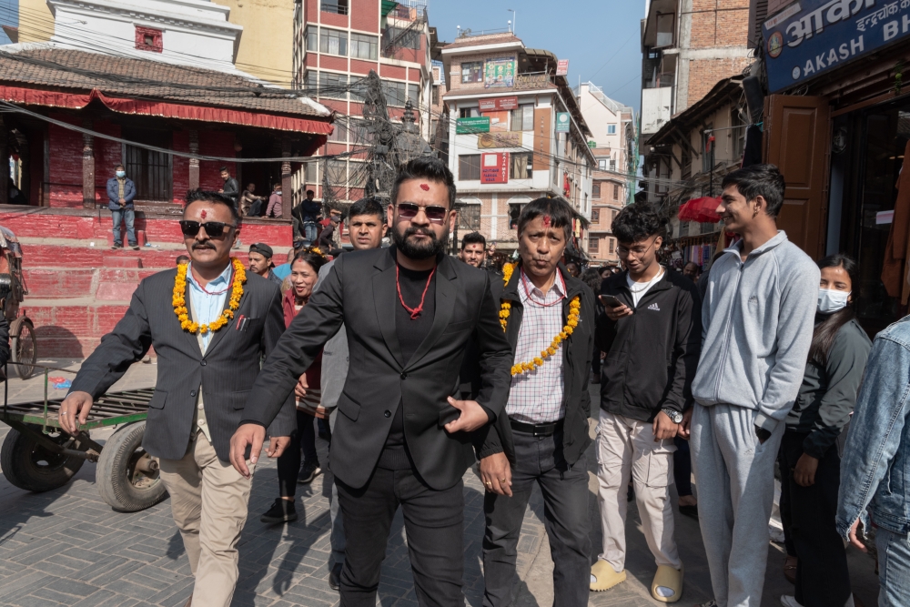 Balendra “Balen” Shah, center, mayor of Kathmandu, after visiting a temple in the capital city of Nepal, Nov. 16, 2022.  (Saumya Khandelwal/The New York Times)