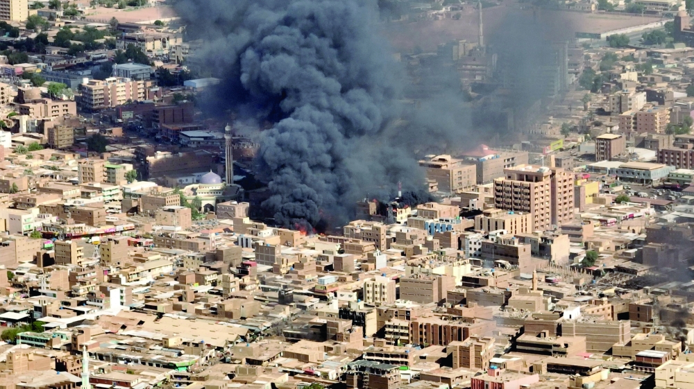 A screen grab shows black smoke and fire at Omdurman market in Omdurman, Sudan. — Reuters