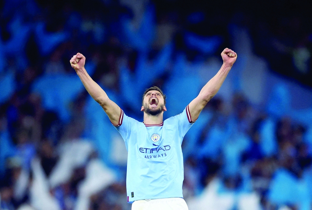Soccer Football - Champions League - Semi Final - Second Leg - Manchester City v Real Madrid - Etihad Stadium, Manchester, Britain - May 17, 2023 Manchester City's Ruben Dias celebrates after the match REUTERS/Carl Recine     TPX IMAGES OF THE DAY
