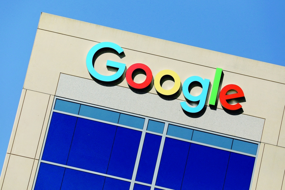 The Google logo is pictured atop an office building in Irvine, US.
 