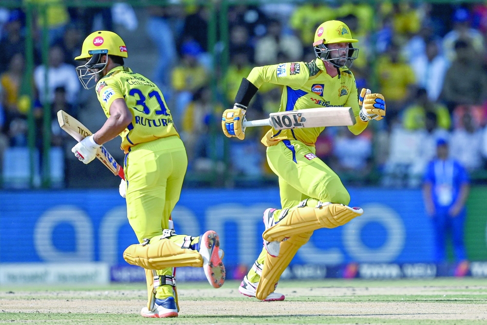 Chennai Super Kings' Devon Conway (R) and Ruturaj Gaikwad run between the wickets during the Indian Premier League (IPL) Twenty20 cricket match between Delhi Capitals and Chennai Super Kings at the Arun Jaitley Stadium in New Delhi on May 20, 2023. (Photo by Arun SANKAR / AFP / )

