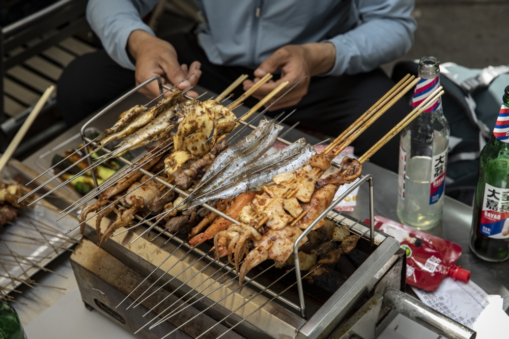 Barbecue at a street market that has become a popular destination, in Zibo, China, May 2, 2023. (Qilai Shen/The New York Times)