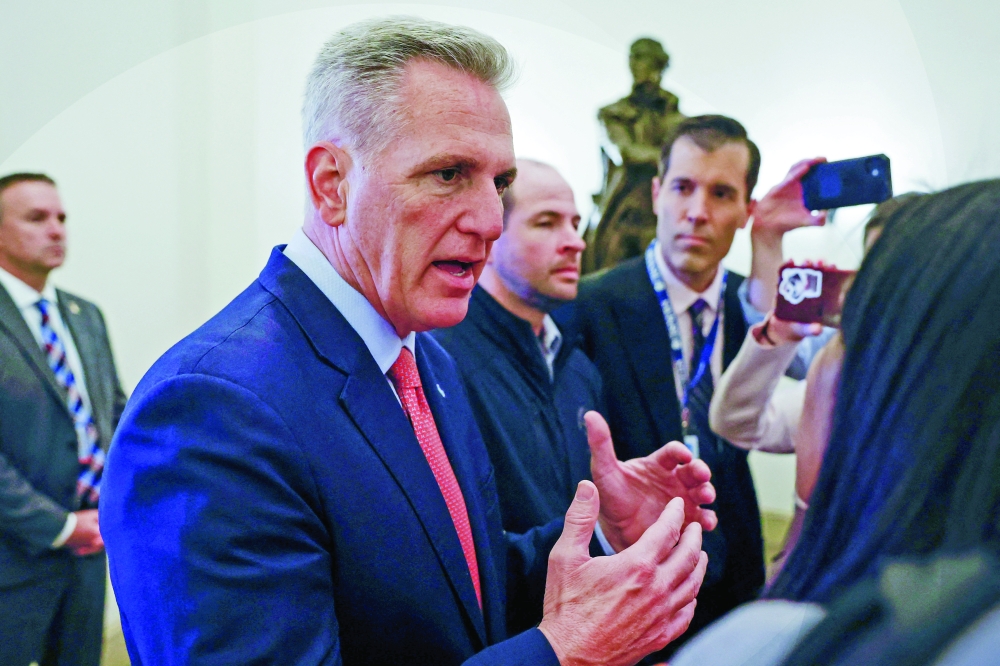 US House Speaker Kevin McCarthy speaks with reporters as he arrives for the day in the midst of ongoing negotiations to raise the United States' debt ceiling. — Reuters