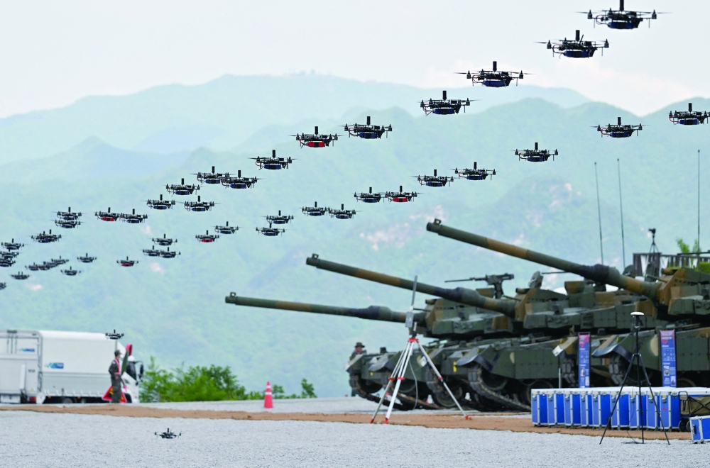 South Korea's military drones fly in formation during a South Korea-US joint military drill at Seungjin Fire Training Field in Pocheon. - AFP


