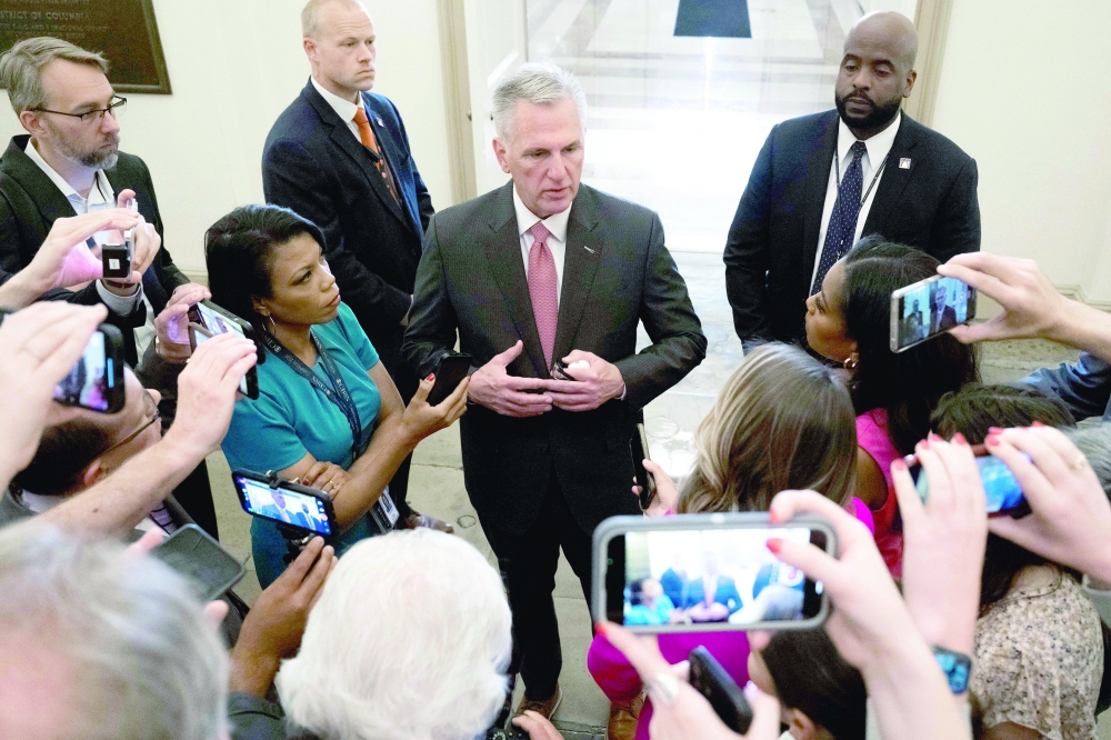 US Speaker of the House Kevin McCarthy speaks to the media about debt ceiling negotiations as he arrives at the US Capitol in Washington, DC. - AFP


