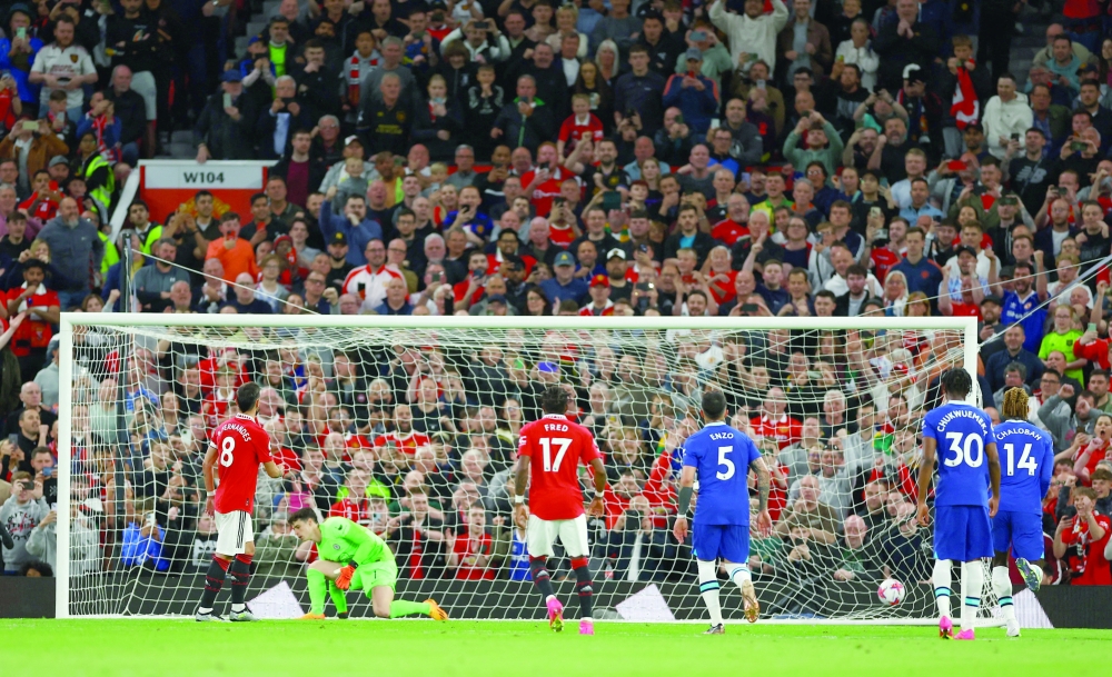 Manchester United's Bruno Fernandes scores their third goal from the penalty spot REUTERS/