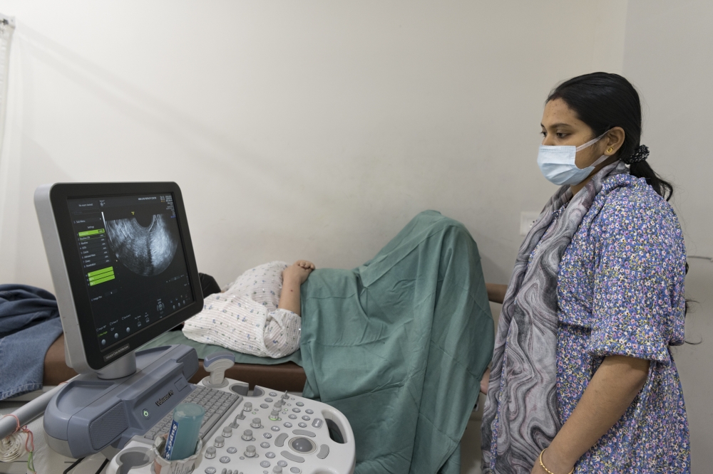 A woman undergoing an ultrasound at the Newlife Fertility Center in Siliguri, West Bengal, India, on April 29, 2023. (Smita Sharma/The New York Times)