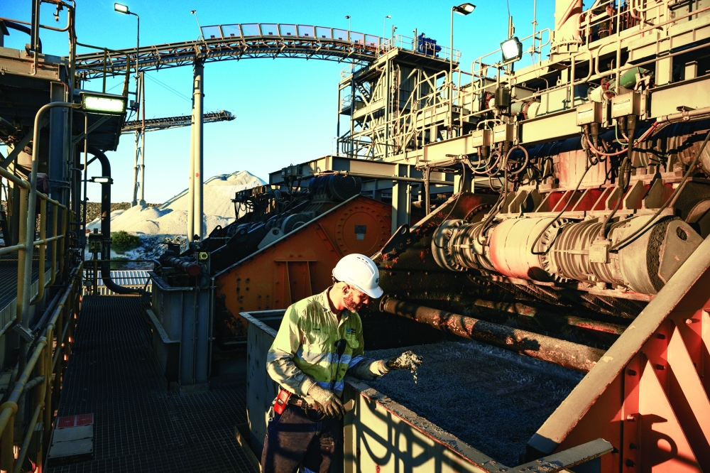 A man inspects processing at the Pilbara Minerals plant, at the Pilbara Minerals lithium mine in Western Australia. — The New York Times