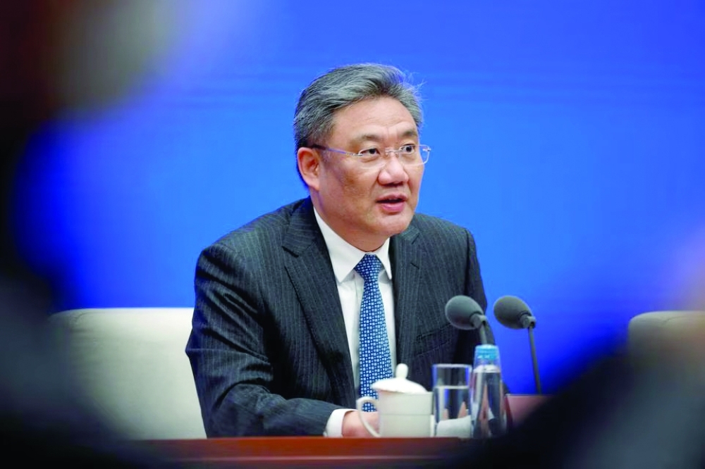 Chinese Commerce Minister Wang Wentao speaks at a news conference in Beijing, China. — Reuters