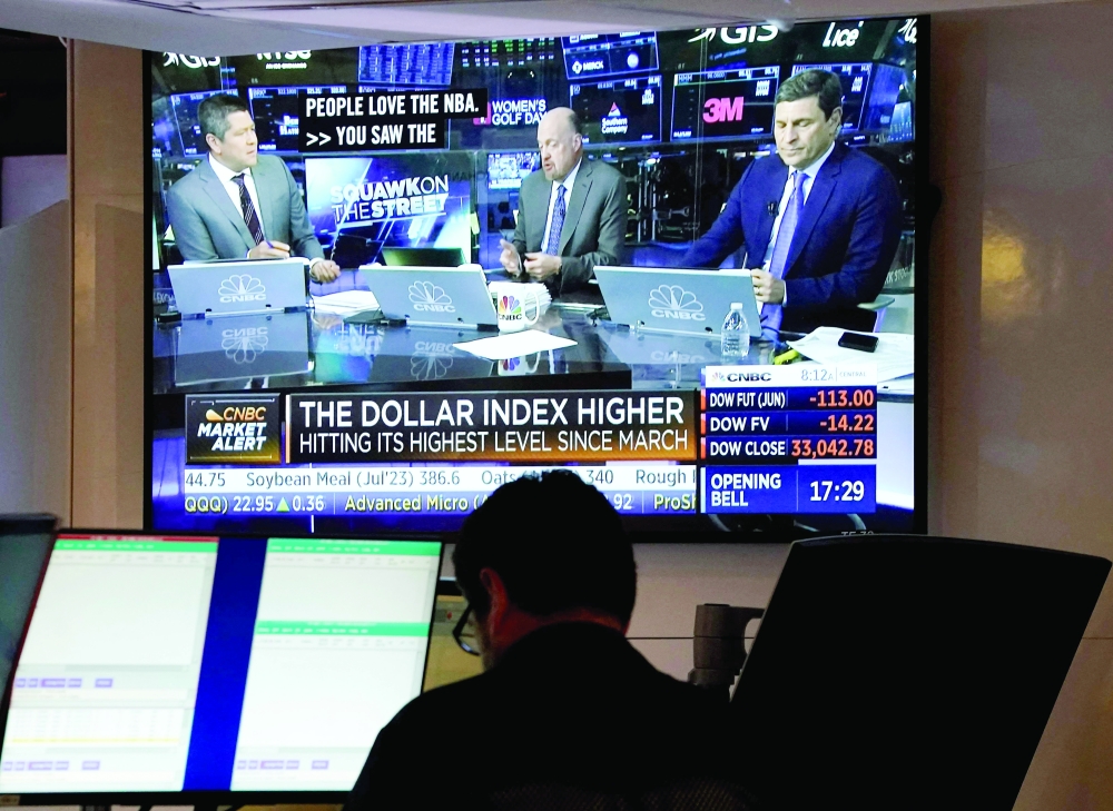 Traders work the floor of the New York Stock Exchange in New York City. - AFP