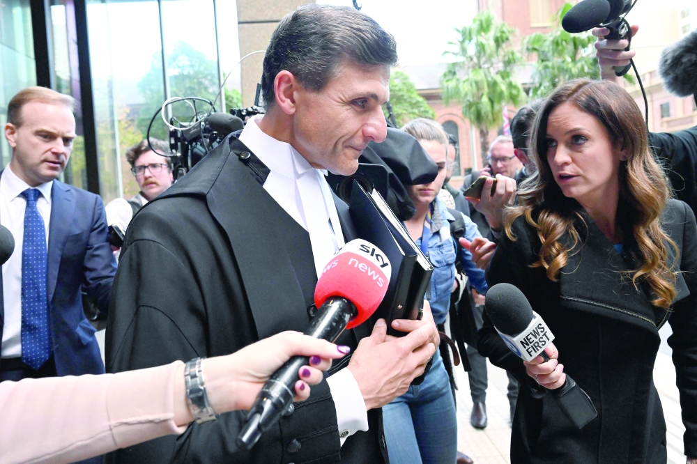Arthur Moses, barrister for former member of Australia's elite Special Air Service regiment Ben Roberts-Smith, leaves the Federal Court in Sydney. - AFP