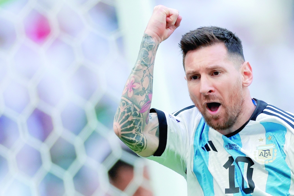 (FILES) In this file photo taken on November 22, 2022, Argentina's forward #10 Lionel Messi celebrates after scoring a goal which was disallowed for an offside during the Qatar 2022 World Cup Group C football match between Argentina and Saudi Arabia at the Lusail Stadium in Lusail, north of Doha. Argentine superstar Lionel Messi will play in Saudi Arabia next season under a blockbuster deal, a source with knowledge of the negotiations told AFP on May 9, 2023. (Photo by Odd ANDERSEN / AFP)

