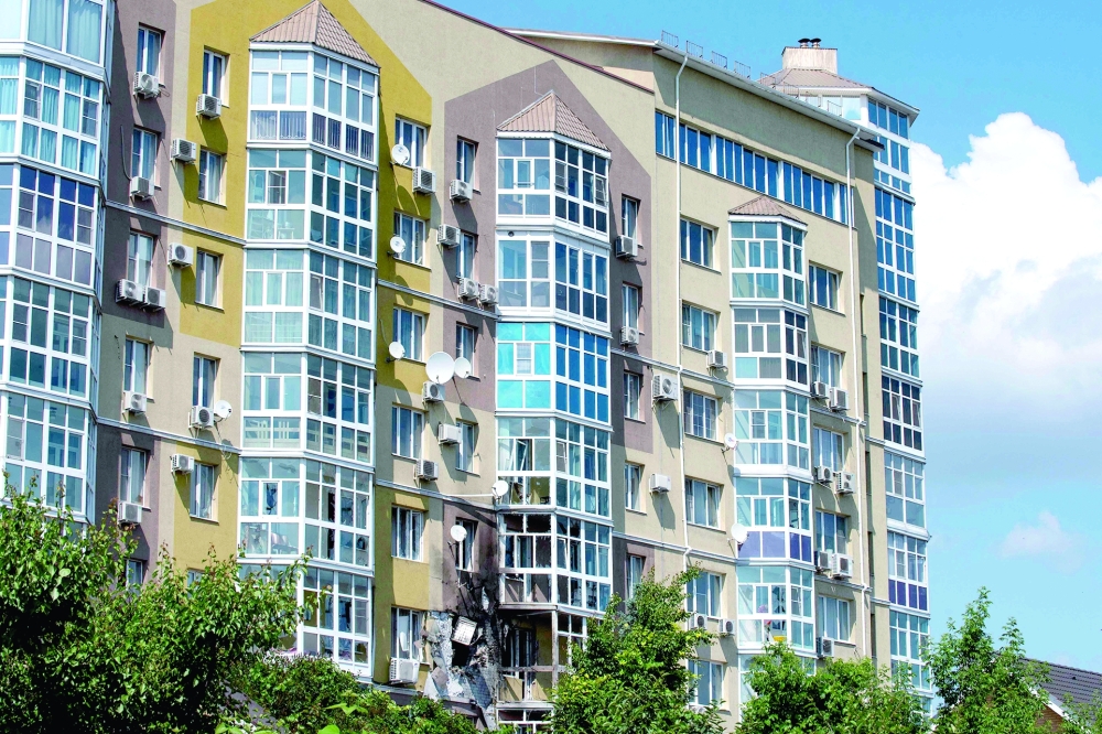 A view of a damaged multi-storey apartment building after a reported drone attack in Voronezh. - AFP


