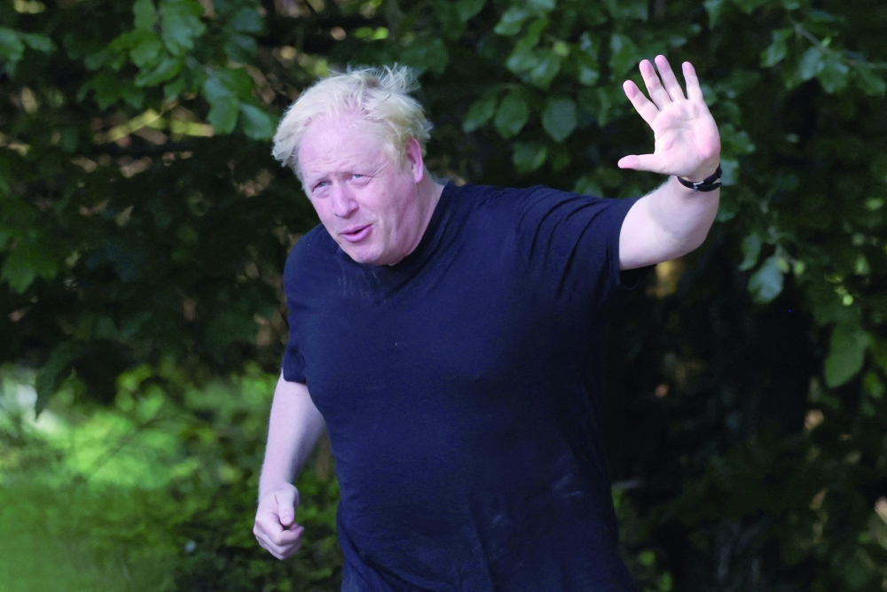 Former British Prime Minister Boris Johnson runs near his home in Brightwell-cum-Sotwell, Oxfordshire, Britain. — Reuters