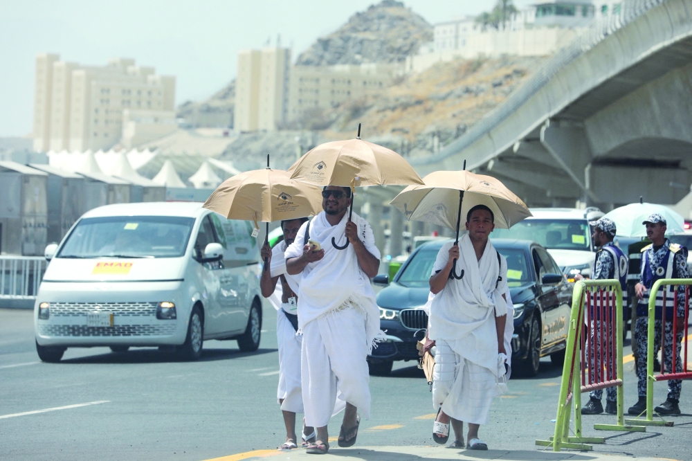 People walk during the annual haj pilgrimage, in the Mina area. Reuters 