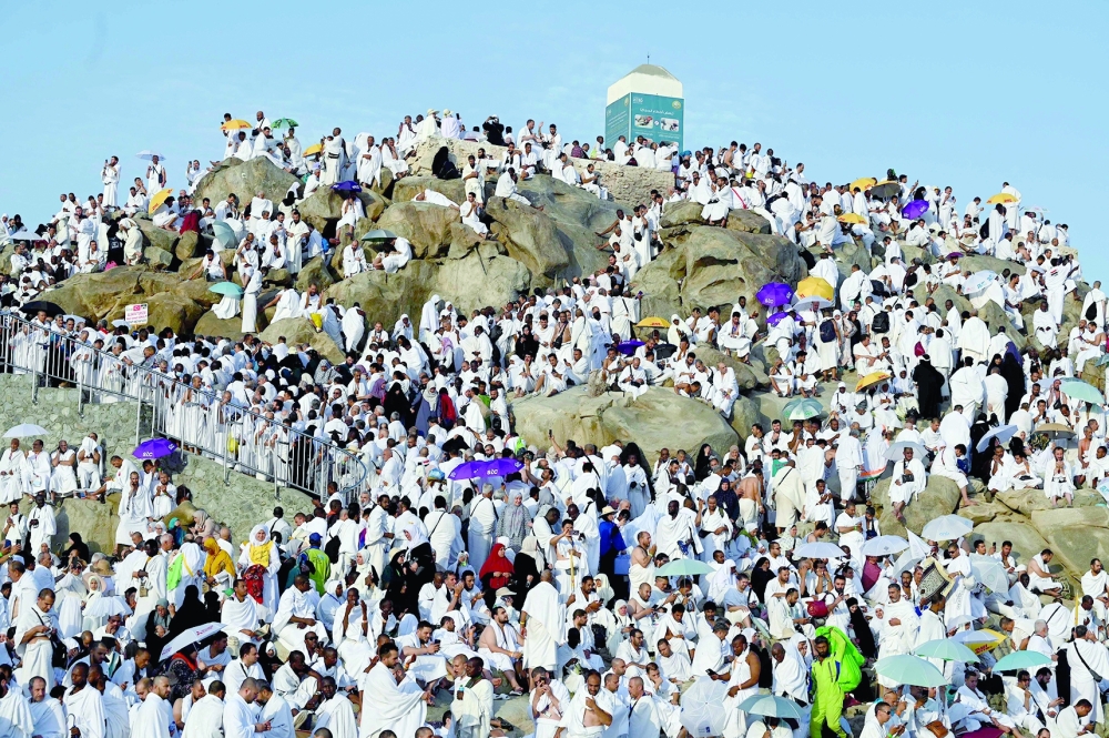 Muslim pilgrims crowd Mount Arafat,also known as Jabal al-Rahma or Mount of Mercy, during the climax of the Haj pilgrimage. — AFP