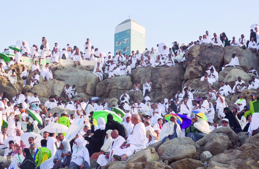 Muslim pilgrims gather on the Mount of Mercy at the plain of Arafat during the annual Haj pilgrimage. — Reuters