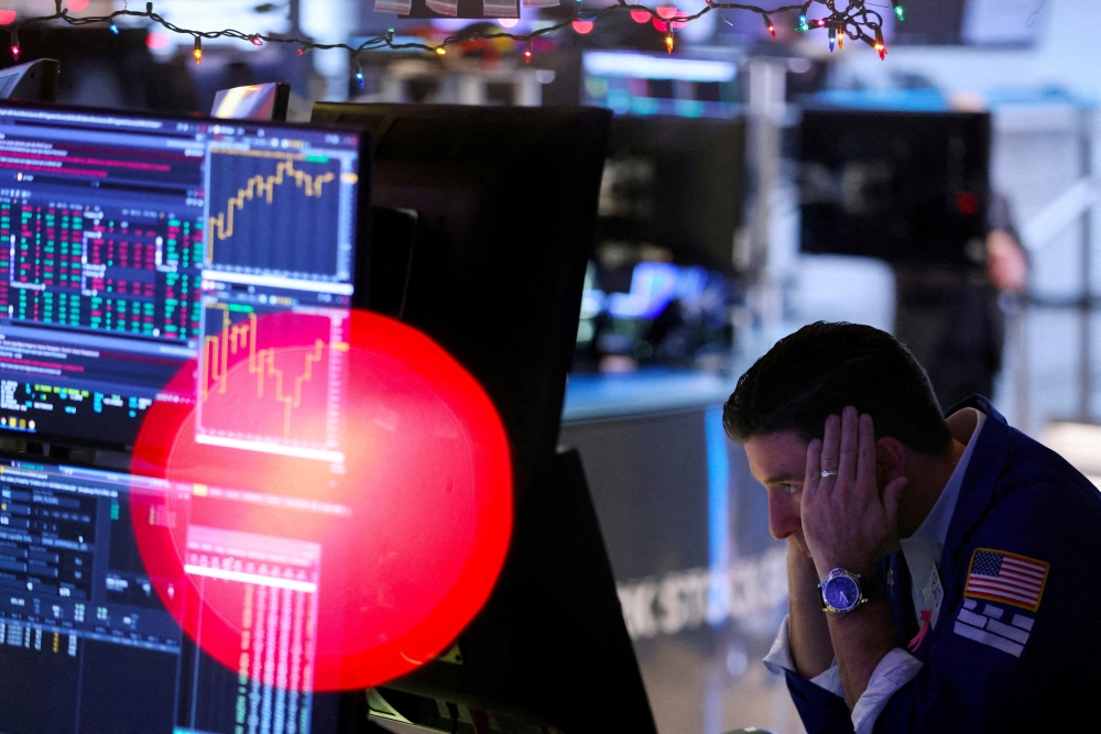 A trader works on the trading floor at the New York Stock Exchange (NYSE) in New York City. — Reuters