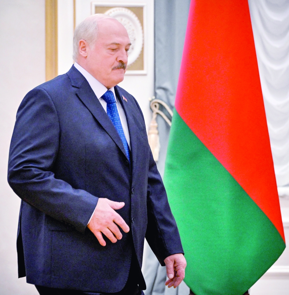 Belarus' President Alexander Lukashenko arrives to meet with foreign media at his residence, the Independence Palace, in Minsk. - AFP
 