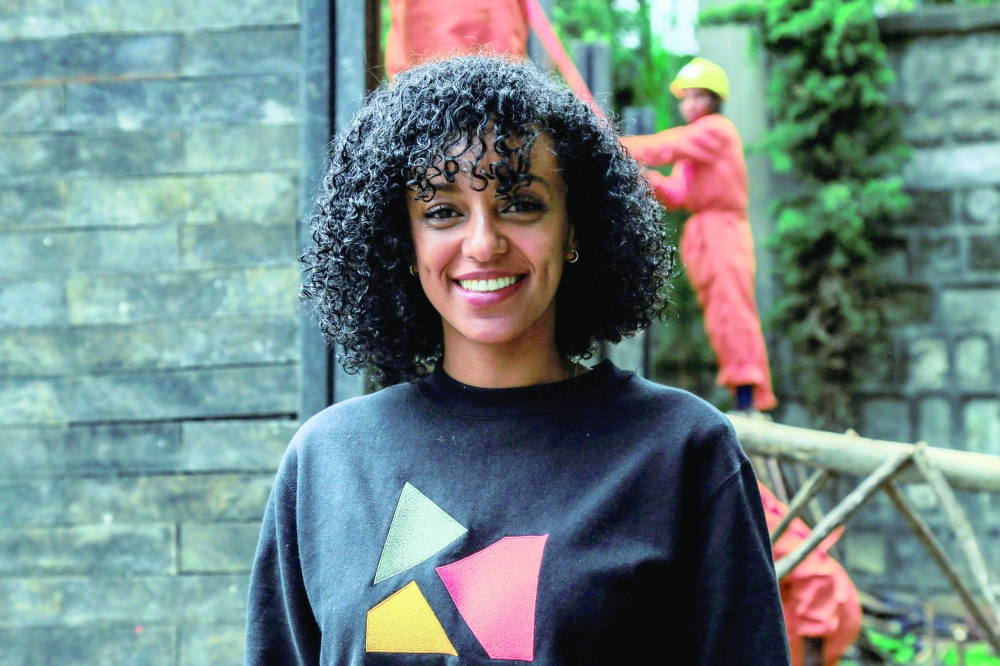 Hayat Hassan Bedane, structural engineer and Kubik construction site supervisor, during an interview in front of the first day care building site built by Kubik in Addis Ababa. - AFP