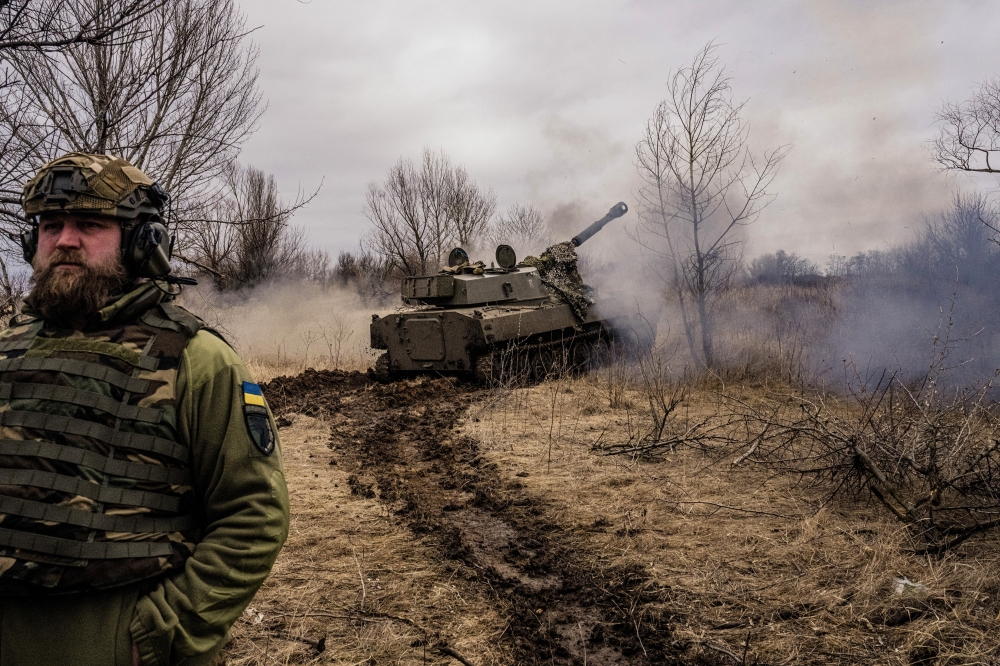 Ukrainian soldiers fire a self-propelled howitzer near Bakhmut on March 2.