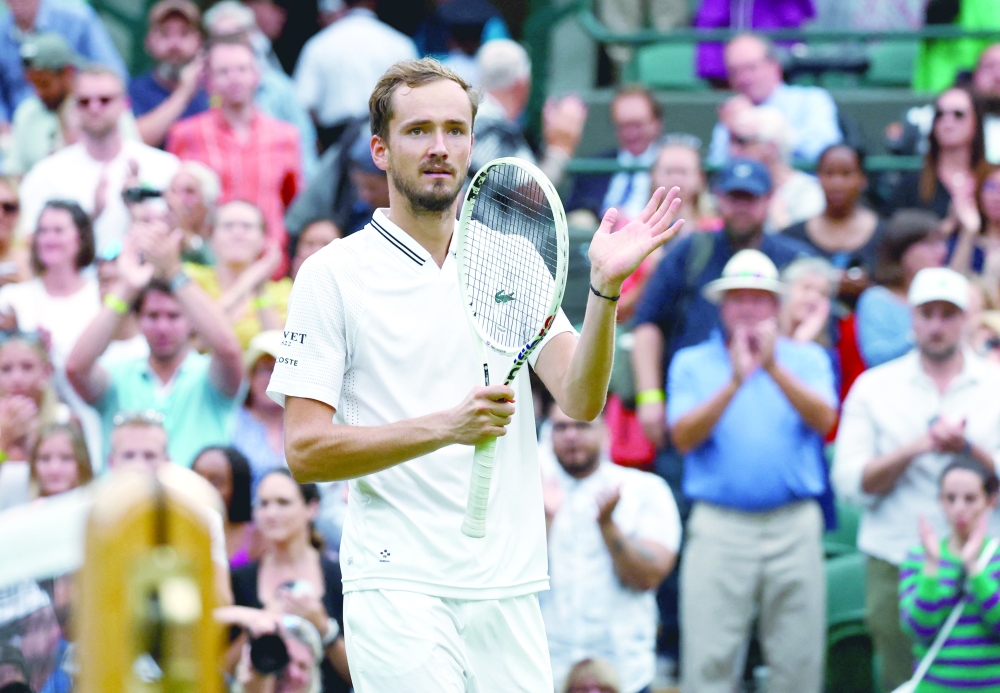 Tennis - Wimbledon - All England Lawn Tennis and Croquet Club, London, Britain - July 12, 2023 Russia's Daniil Medvedev celebrates winning his quarter final match against Christopher Eubanks of the U.S. REUTERS/Toby Melville
