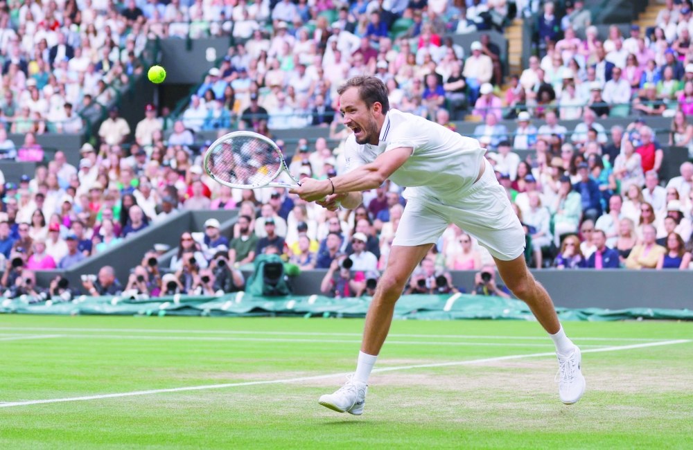 Tennis - Wimbledon - All England Lawn Tennis and Croquet Club, London, Britain - July 12, 2023 Russia's Daniil Medvedev in action during his quarter final match against Christopher Eubanks of the U.S. REUTERS/Andrew Couldridge
