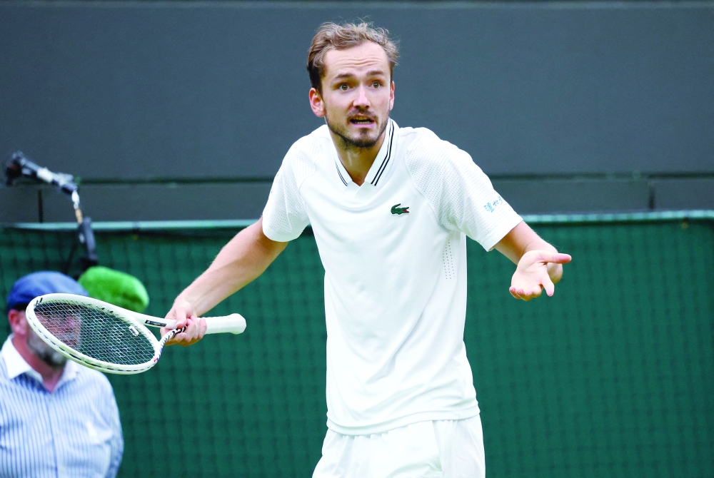 Tennis - Wimbledon - All England Lawn Tennis and Croquet Club, London, Britain - July 12, 2023 Russia's Daniil Medvedev reacts during his quarter final match against Christopher Eubanks of the U.S. REUTERS/Toby Melville
