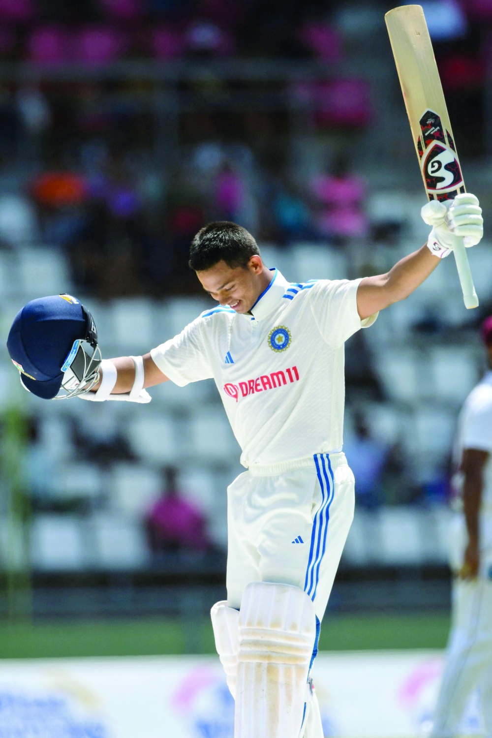 Yashasvi Jaiswal, of India, celebrates his century during day two of the First Test between West Indies and India at Windsor Park in Roseau, Dominica, on July 13, 2023. (Photo by Randy Brooks / AFP)

