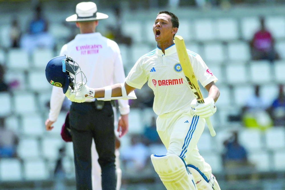 Yashasvi Jaiswal of India celebrates his century during day two of the First Test between West Indies and India at Windsor Park in Roseau, Dominica, on July 13, 2023. (Photo by Randy Brooks / AFP)

