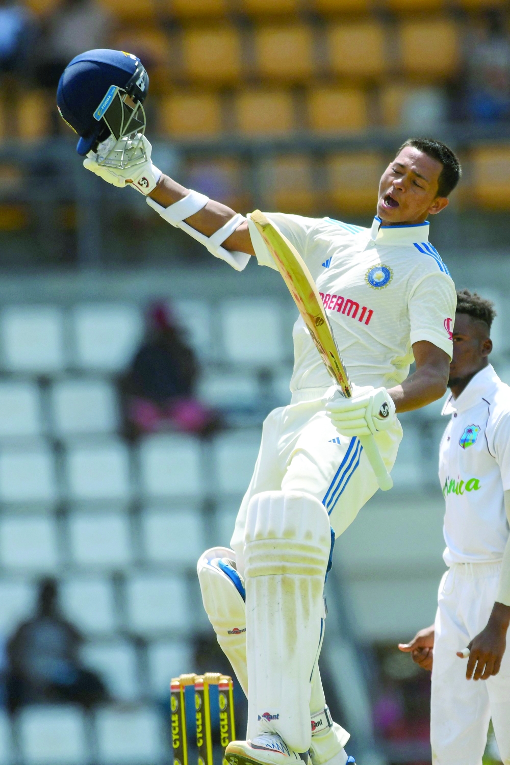 Yashasvi Jaiswal of India celebrates his century during day two of the First Test between West Indies and India at Windsor Park in Roseau, Dominica, on July 13, 2023. (Photo by Randy Brooks / AFP)

