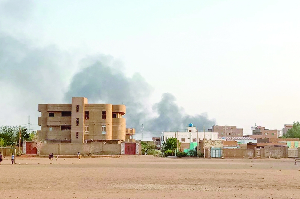 Smoke billows in the distance around the Khartoum Bahri district amid ongoing fighting. AFP