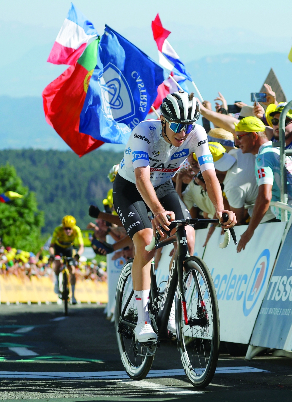 Cycling - Tour de France - Stage 13 - Chatillon-Sur-Chalaronne to Grand Colombier - France - July 14, 2023 UAE Team Emirates' Tadej Pogacar followed by Team Jumbo-Visma's Jonas Vingegaard, in action before crossing the finish line after stage 13 REUTERS/Stephane Mahe
