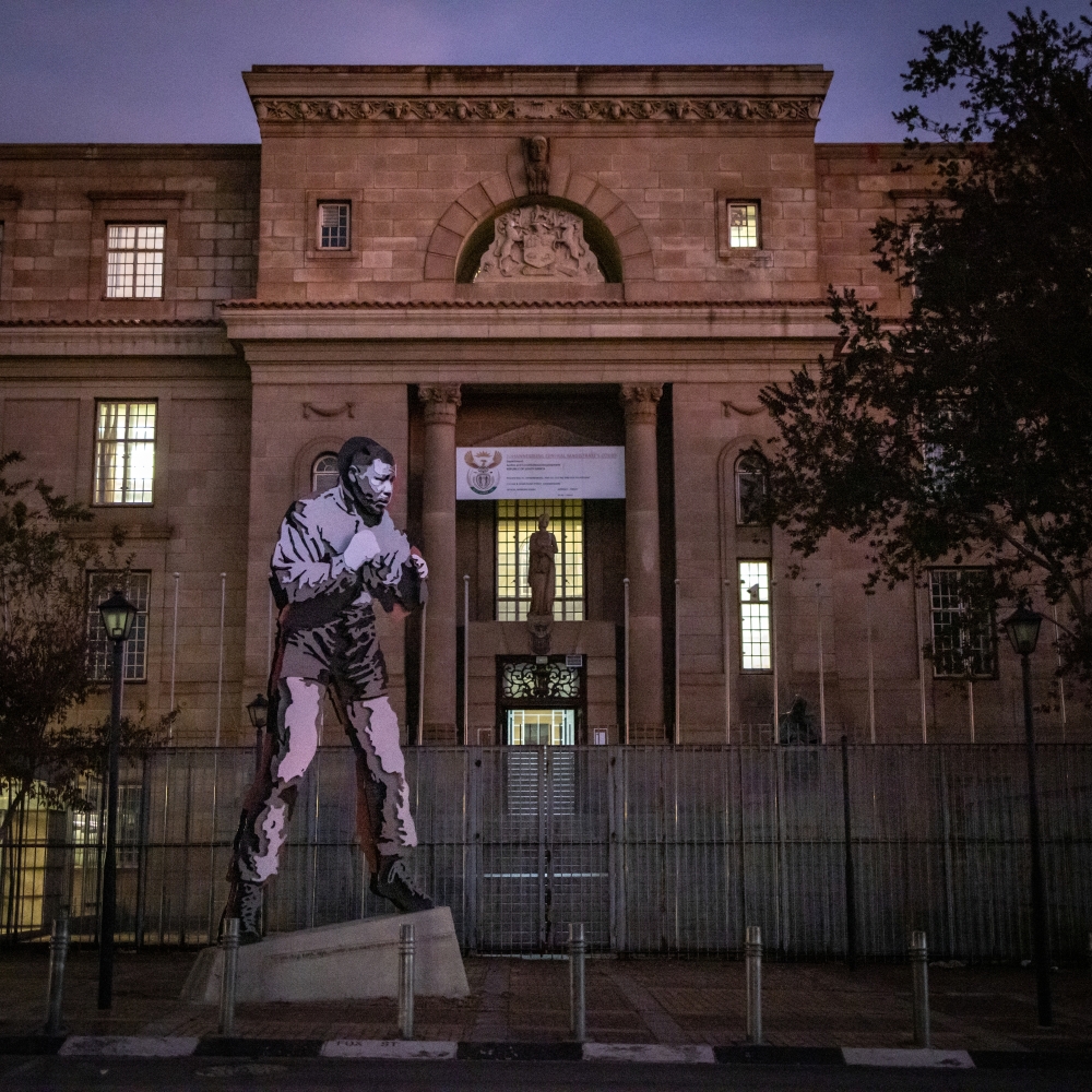 A 20-foot sculpture of a young Nelson Mandela as a boxer outside the Johannesburg Central Magistrate’s Court on July 10, 2023. (Gulshan Khan/The New York Times)