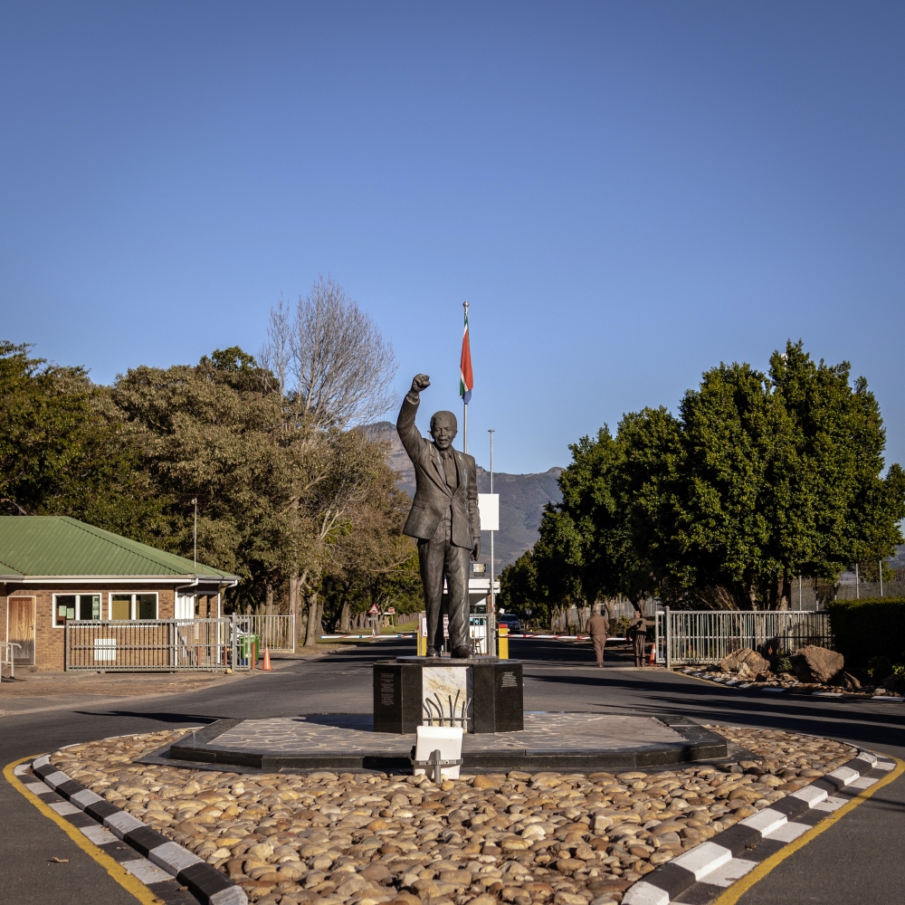 A statue depicting Nelson Mandela outside a prison in Paarl, South Africa, where Mandela was held for 14 months until his release in February 1990.   (Gulshan Khan/The New York Times)